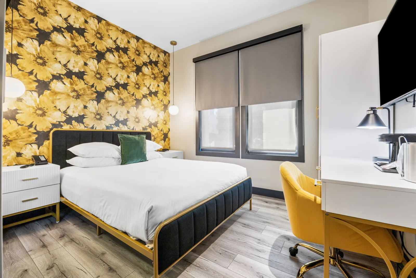 Queen room with gold floral wallpaper